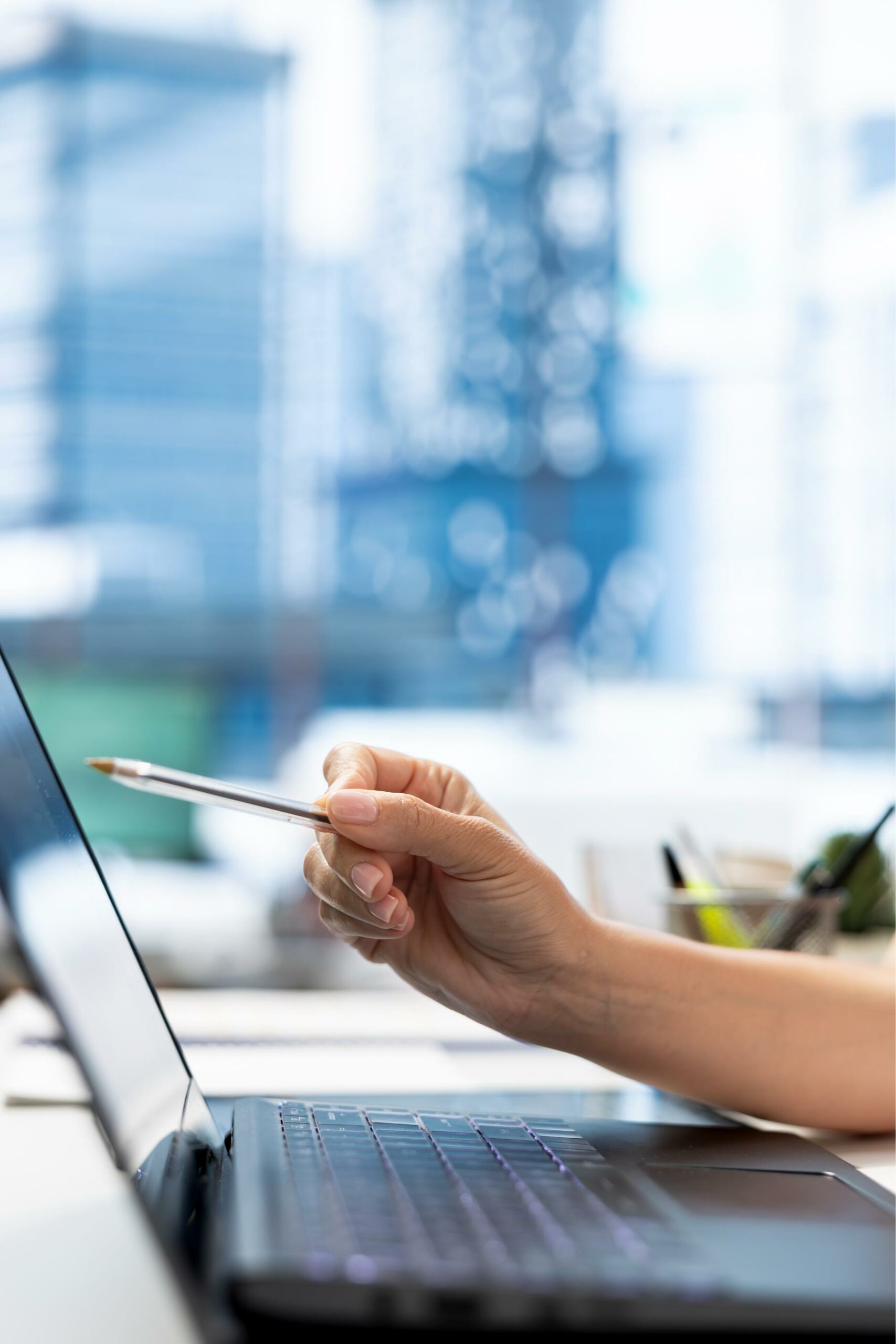 hr department worker using laptop background checks job applicants 2 scaled